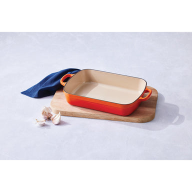 Le Creuset 4.9L Flame Rectangular Roaster  with garlic
