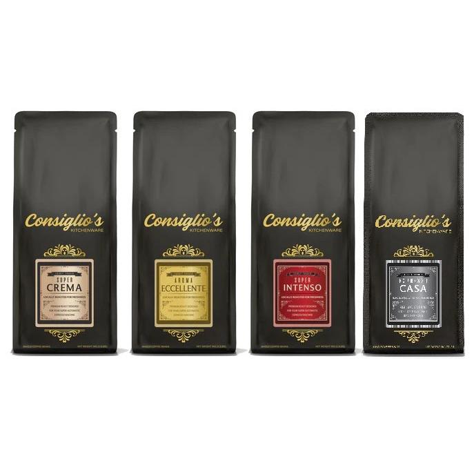 Four black coffee bags from Consiglio's Kitchenware with different coffee types on a white background.
