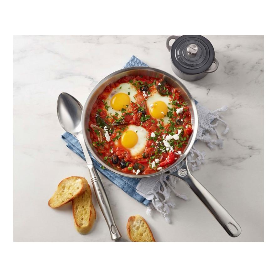 https://www.consiglioskitchenware.com/cdn/shop/products/Le_Creuset_30_cm_Stainless_Steel_Frying_Pan_12_Eggs_Canada_3b6479ad-c14d-4fc5-abf5-63b12e262b7f_884x884.jpg?v=1698682260